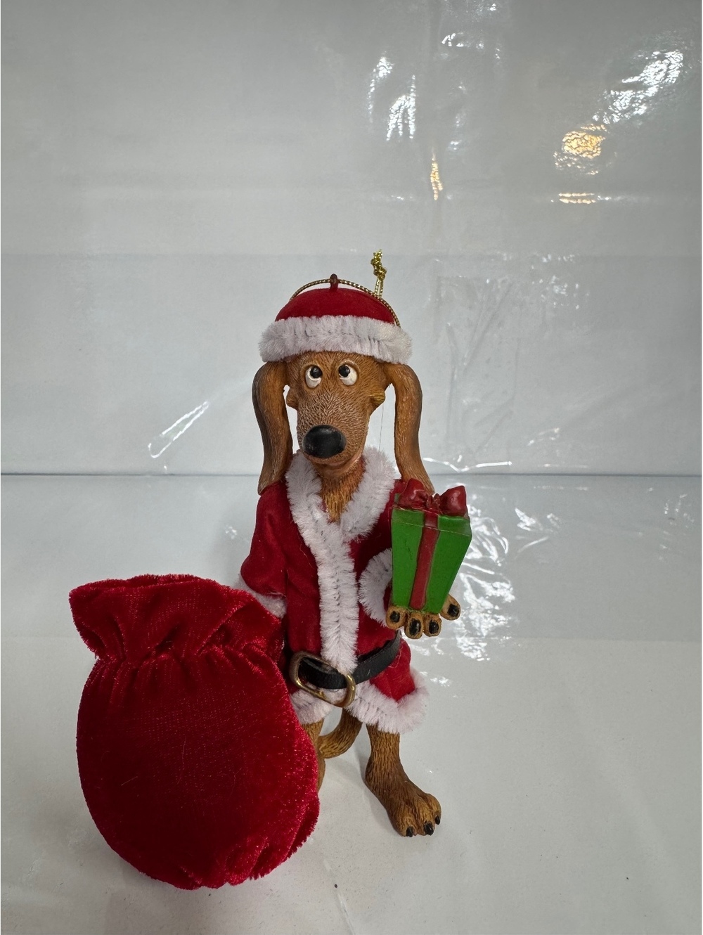 Dachshund Santa Ornament with Red Velvet Sack Christmas Decoration
